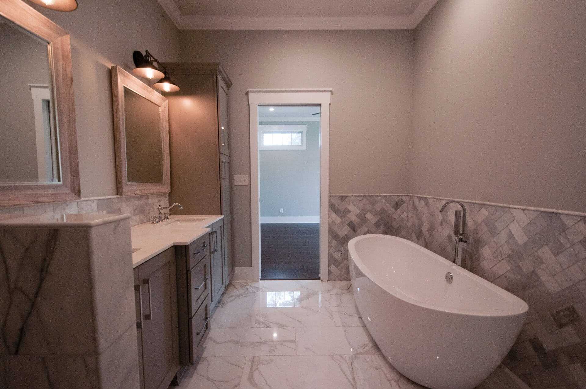 Custom designed bathroom in Shotgun Cottage on Lloyd Street in East Hill by Good Foundations, Inc.