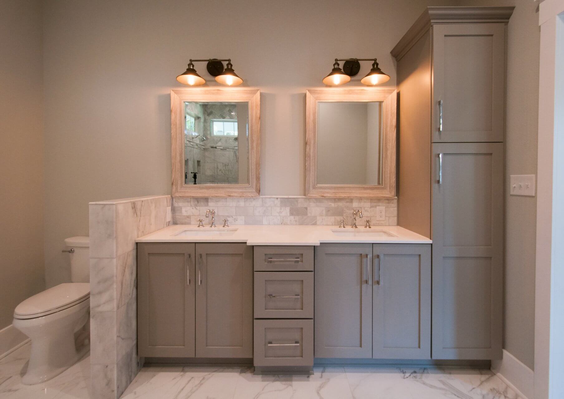 Double sink in bathroom of Shotgun Cottage on Lloyd Street in East Hill