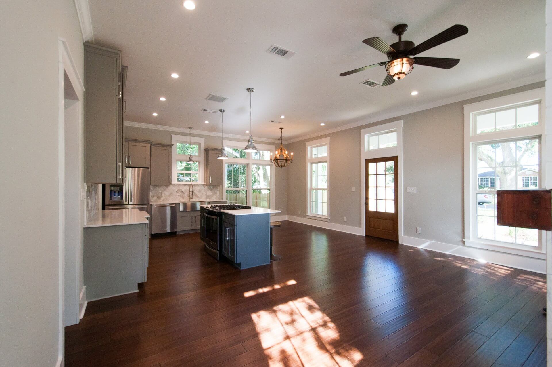 Open kitchen and dining area in Shotgun Cottage on Lloyd Street in East Hill