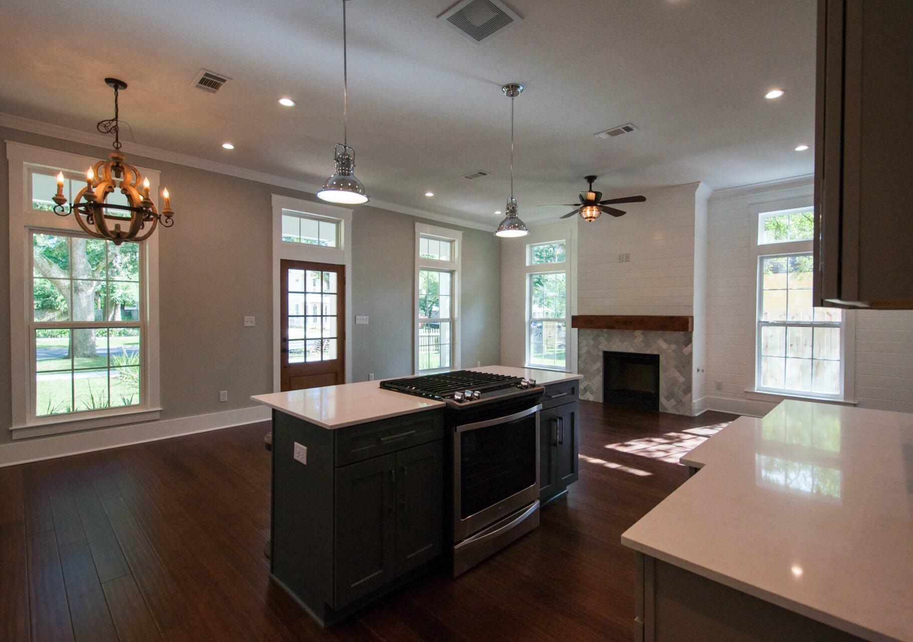 View of kitchen island in custom designed Shotgun Cottage on Lloyd Street in East Hill